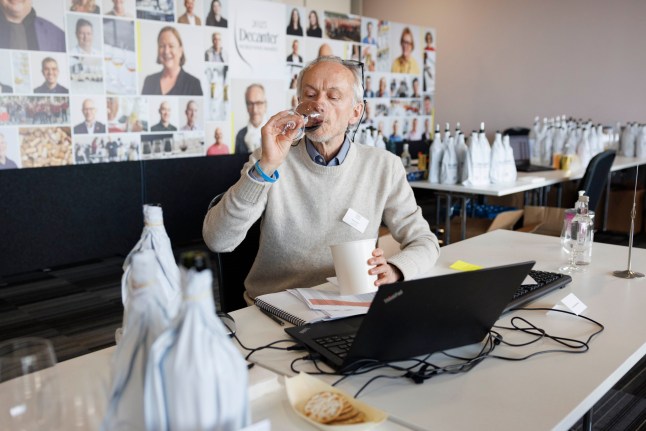 Behind the scenes at the judging of Decanter Awards in Excel today. Pictured: Andrew Jefford, co-chair of Decanter, tastes wine in a judging room. (C) Belinda Jiao 07598931257 www.belindajiao.com jiao.bilin@gmail.com