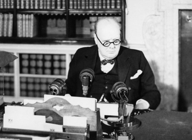 VE Day Celebrations In London, 8 May 1945, The Prime Minister Winston Churchill at a BBC microphone about to broadcast to the nation on the afternoon of VE Day, 8 May 1945. (Photo by Mr Egalton/ Imperial War Museums via Getty Images)